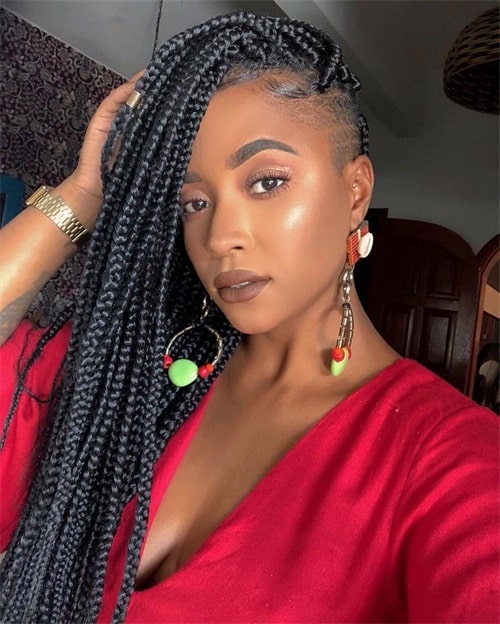 Jumbo braids with fade haircut
