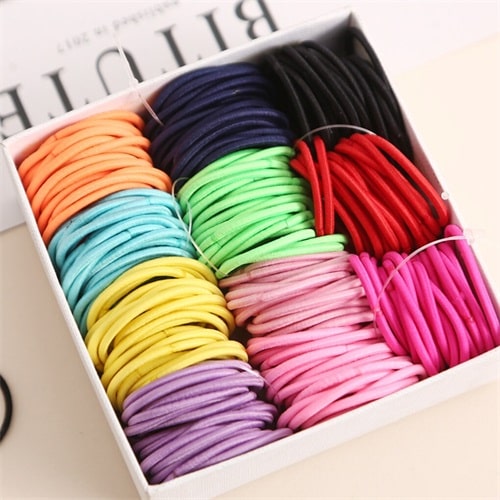 Colored rubber bands are great when you want to add a playful style to your hairstyle
