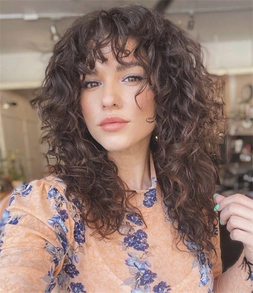 Wolf cuts are edgy and a great choice for almost all hair types, from straight to curly and hair length.