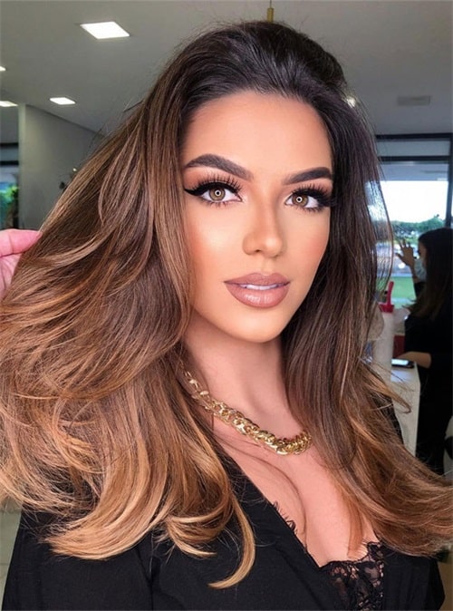 with cinnamon highlights in caramel brown or bronze hair tones