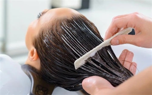 Deep condition your brassy hair to make it look shinier and healthier