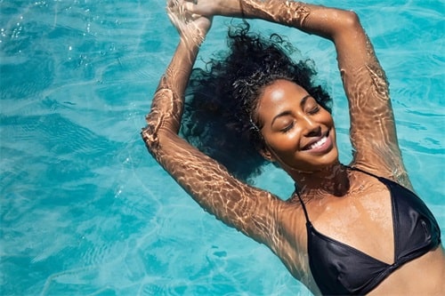 How To Protect Hair From Pool Damage In Summer