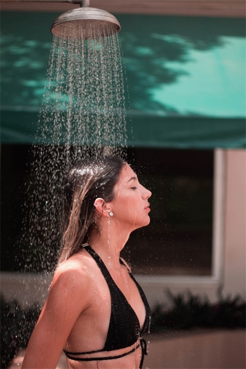 Wet your hair with cool or warm water