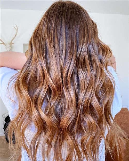 strawberry blonde balayage on brown hair