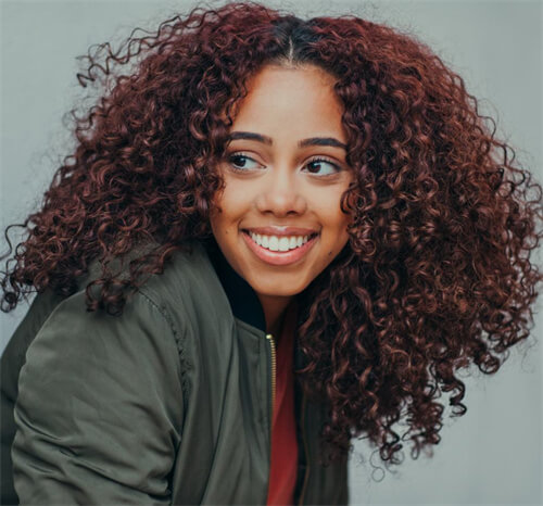 Afro middle parted hairstyle