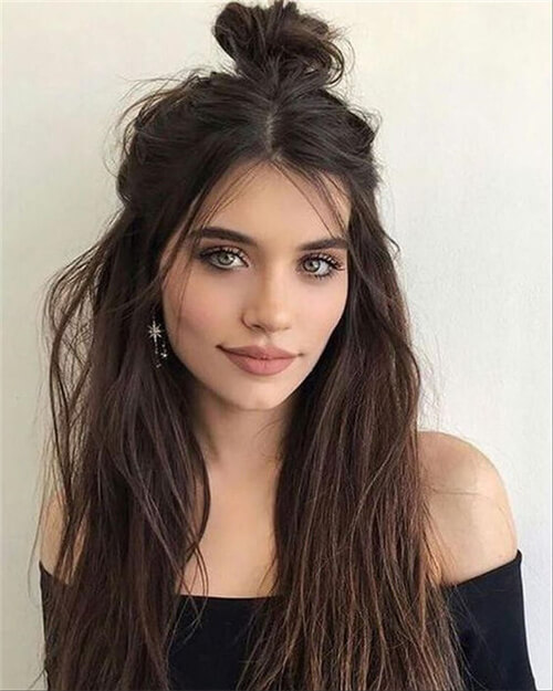 half up half down middle part hairstyle