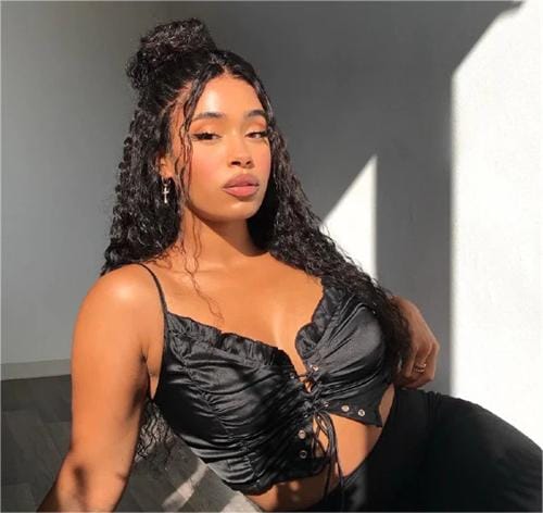 high bun with half down long deep wave